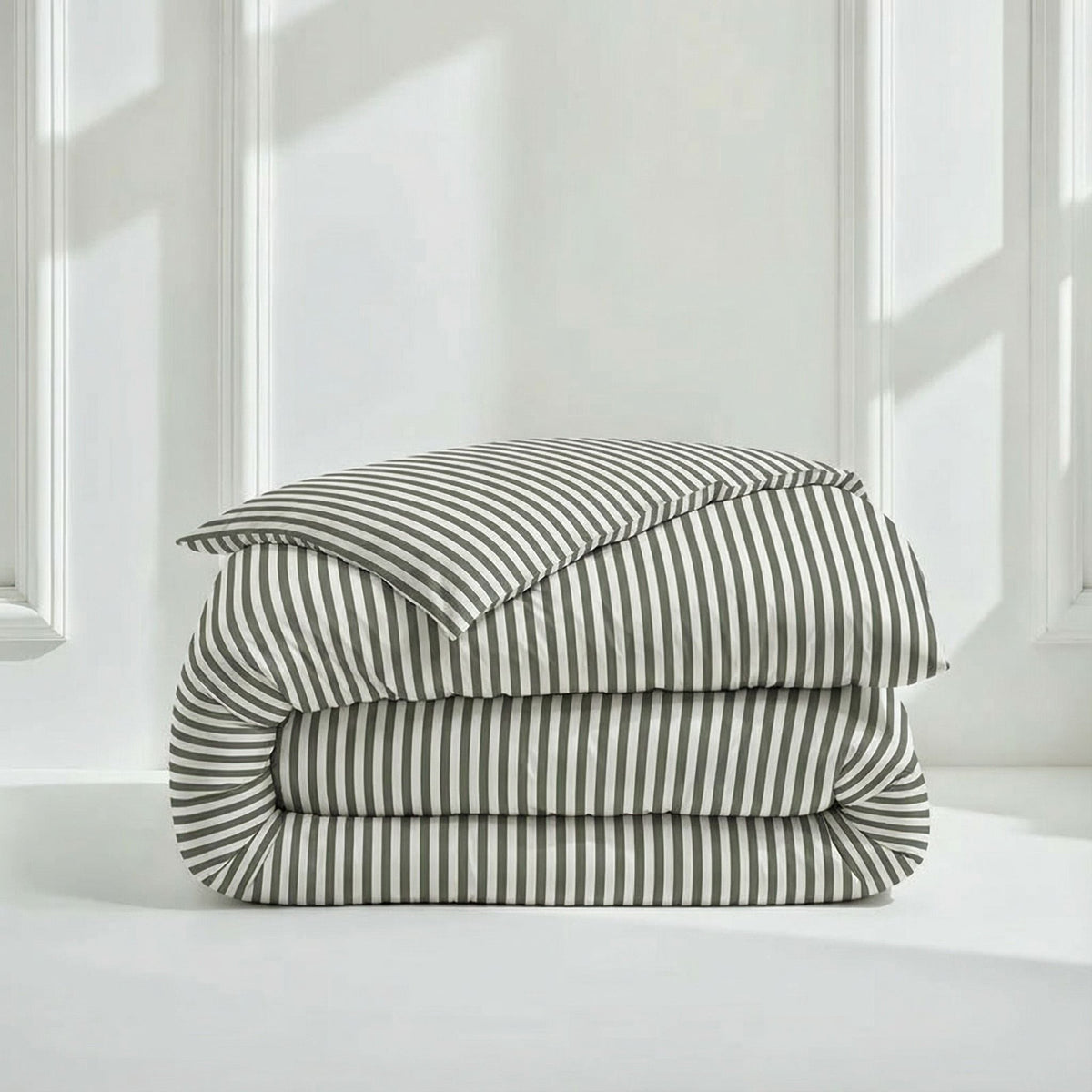Blue and white Luxe Australian Sateen Bedding Bundle by Italic on a twin bed, featuring smooth, luxurious fabric and elegant design.