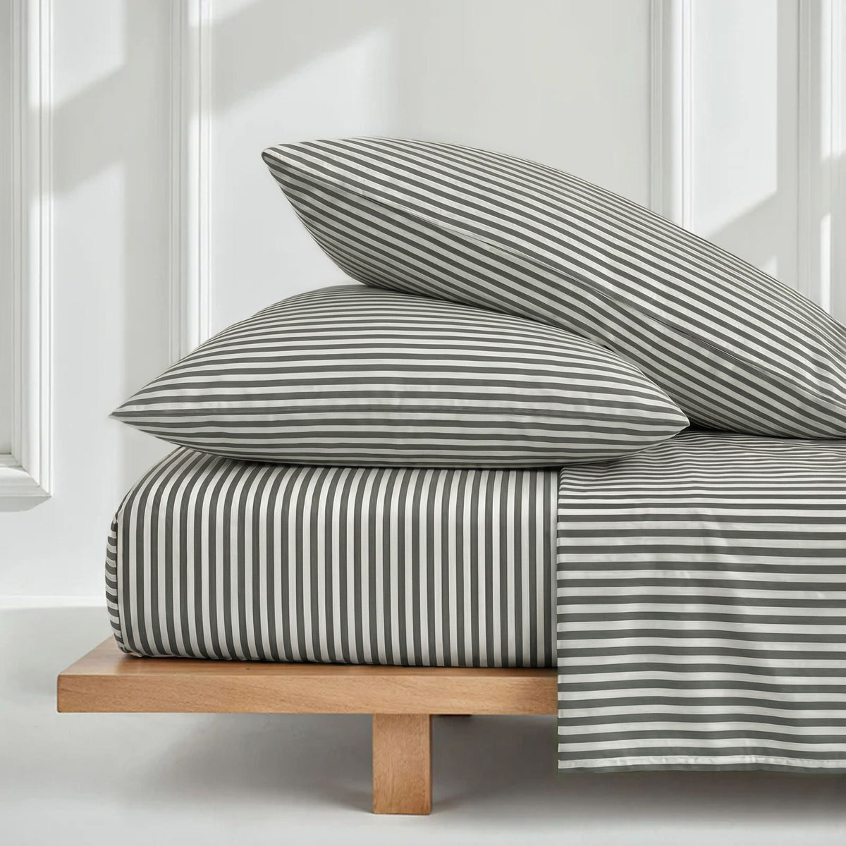 Blue and white Luxe Australian Sateen Bedding Bundle for twin beds by Italic, featuring smooth, luxurious satin sheets and pillowcases.