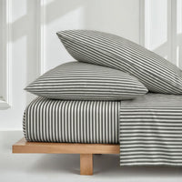 Blue and white Luxe Australian Sateen Bedding Bundle for twin beds by Italic, featuring smooth, luxurious satin sheets and pillowcases.