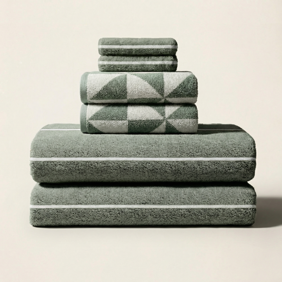 Set of two Sage and Ecru Deia Towels by Italic for home bed decor, soft and plush washcloths with a luxurious texture.