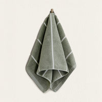 Set of two Italic Deia Towels for bed, sage and ecru washcloths with soft, plush texture, ideal for home use.