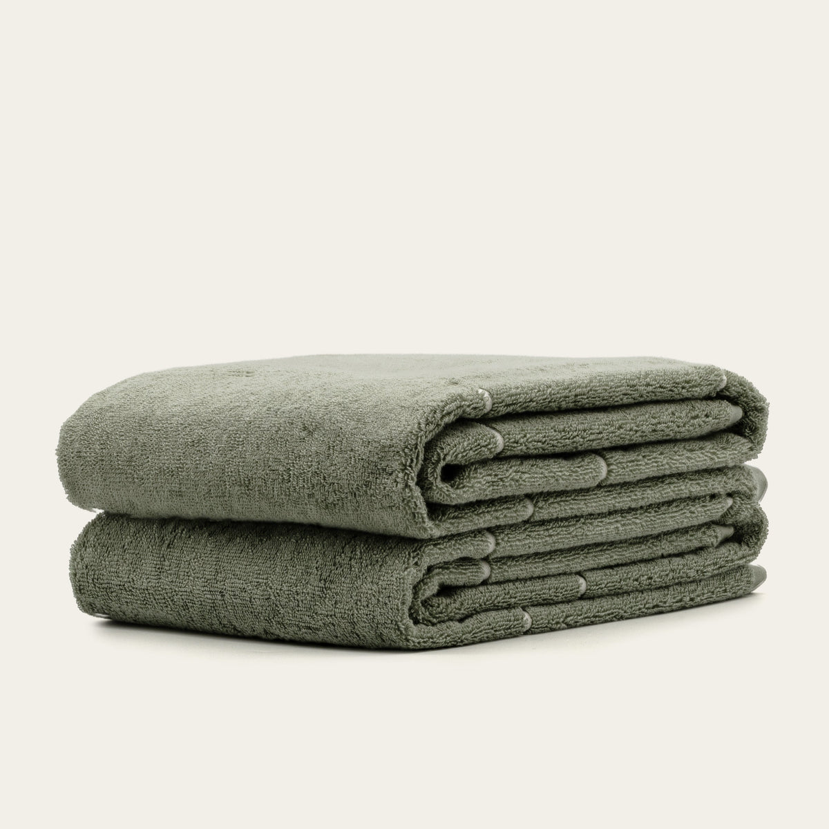 Set of two Italic Deia home bed washcloths in sage and ecru, soft and plush for everyday comfort.