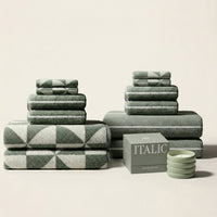 Set of two Italic Deia Towels for home bed, sage and ecru washcloths, soft and plush for comfortable bedding and bathroom use.