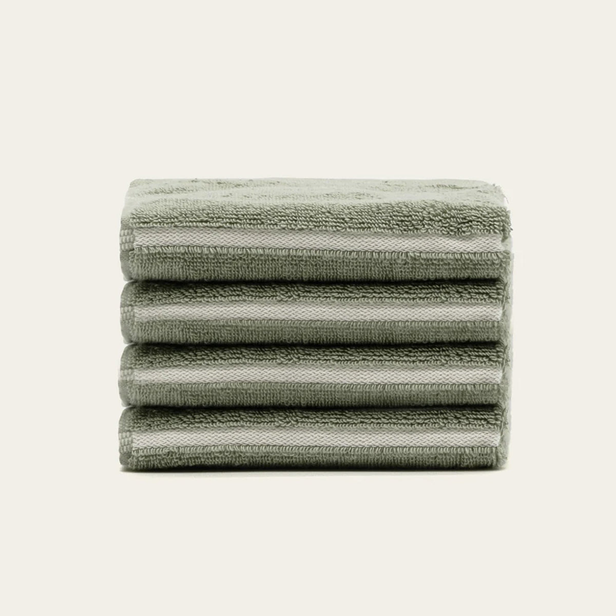 Set of two Italic Deia Towels for bed, sage and ecru color, soft home linen with a clean, cozy look.