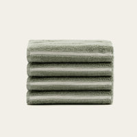 Set of two Italic Deia Towels for bed, sage and ecru color, soft home linen with a clean, cozy look.