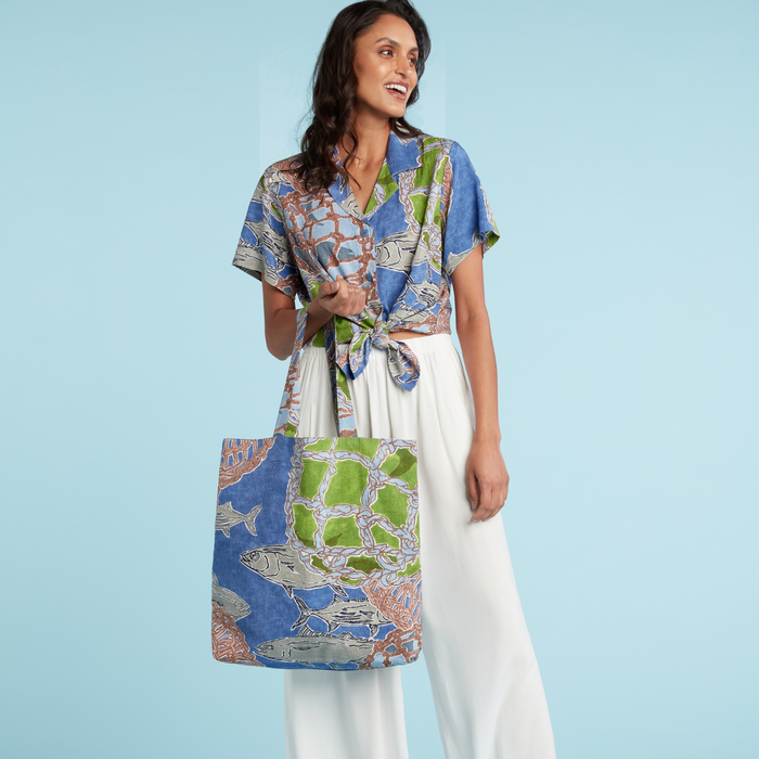 Farmers' Market bag with colorful fishing float designs, eco-friendly tote made of durable material for shopping and carrying essentials.
