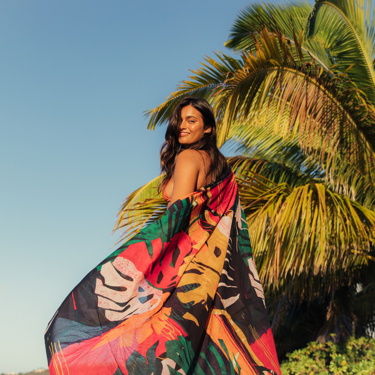 Colorful Fern Grotto pareo by jamsworld.com featuring tropical leaf patterns, lightweight fabric, ideal for beachwear or casual cover-ups.
