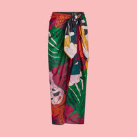 Colorful Fern Grotto Pareo from Jamsworld displayed on a model, showcasing vibrant tropical print and lightweight fabric.