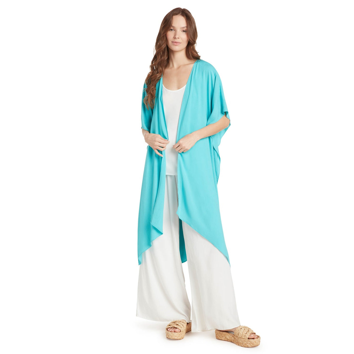 Solid ocean-colored kimono jacket for women, stylish cover-up with flowing fabric and wide sleeves, perfect for beach or casual wear.