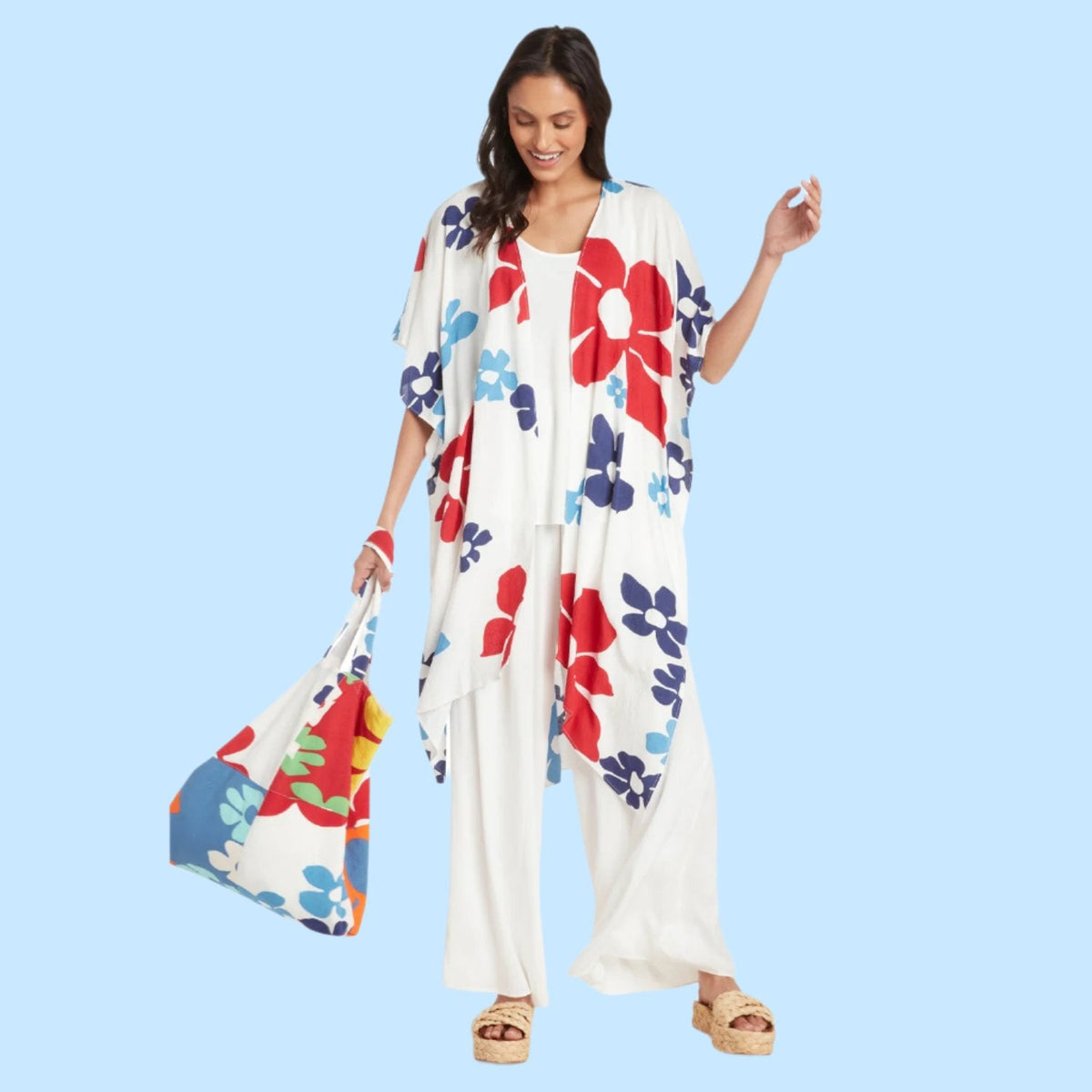 Women's Kimono Jacket by Tradewinds USA, stylish lightweight top with floral patterns and wide sleeves, perfect for casual wear.