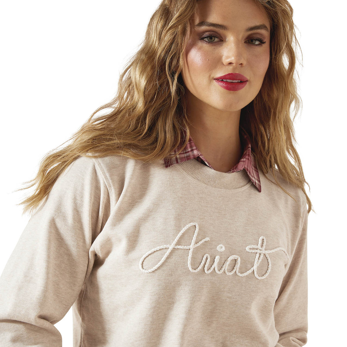 Ariat women's Essential Crew Sweatshirt in gray, casual fit, soft fabric, and ribbed cuffs, suitable for outdoor or everyday wear.