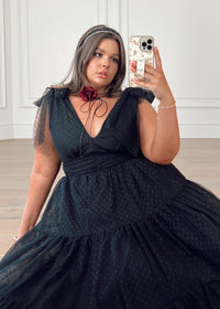 Black Jeanne Dress by JessaKae, featuring a stylish fit and elegant design, shown on a mannequin.