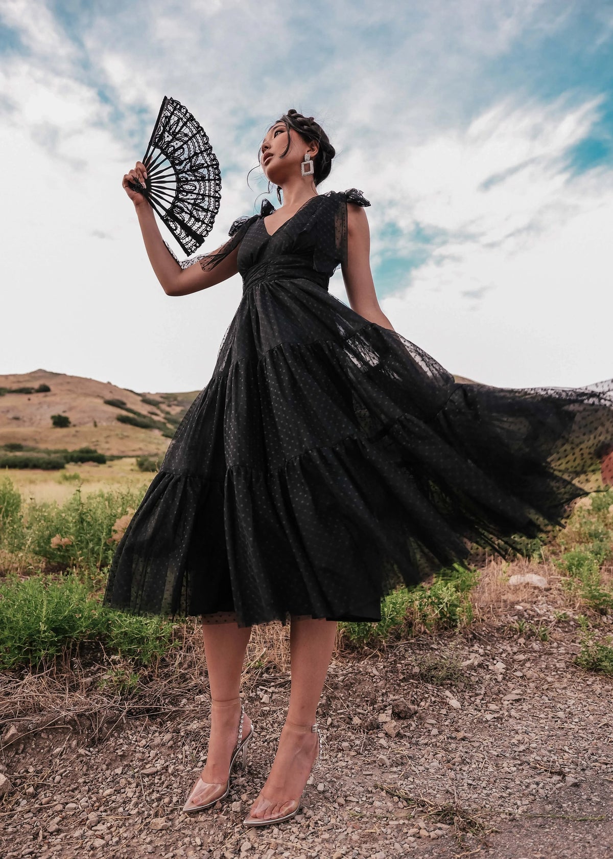 Black Jeanne Dress by JessaKae, showcasing a stylish, fitted dress with long sleeves and a sleek silhouette.