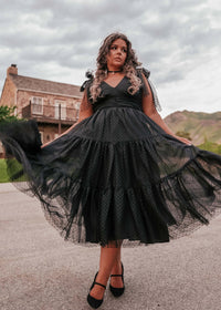 Black Jeanne Dress by JessaKae, featuring a stylish dress with a fitted silhouette and elegant design, shown in size XXS.