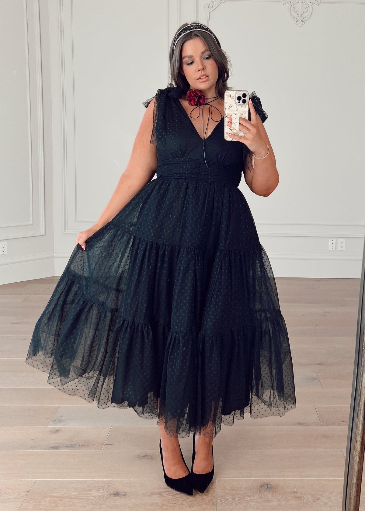 JessaKae Jeanne Black Dress in XS, featuring a fitted silhouette, short sleeves, and elegant design for stylish occasions.