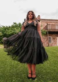 Black Jeanne Dress by JessaKae, featuring a stylish, fitted design with long sleeves and a flattering silhouette.