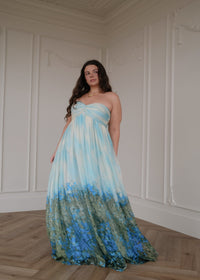 Blue Kimberly Dress by JessaKae featuring a flowy silhouette and elegant design, perfect for casual or semi-formal occasions.