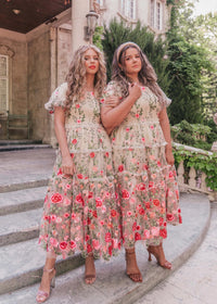 Cream floral midi rose dress by JessaKae, featuring a fitted bodice and flowing skirt, perfect for elegant occasions.