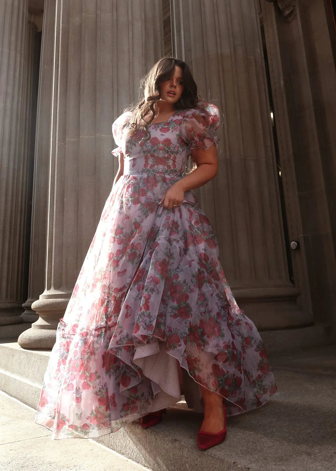 Lavender Cordelia Dress by JessaKae, featuring a flowy silhouette and floral rose pattern, displayed on a hanger.