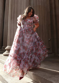 Lavender Cordelia Dress by JessaKae, featuring a flowy design with floral patterns and a fitted waist, perfect for elegant occasions.