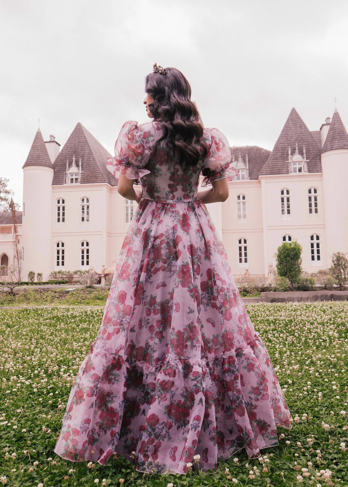 Lavender Cordelia Dress by JessaKae featuring a flowing fabric and floral rose pattern, displayed on a dress form.