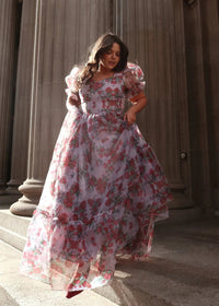 Lavender Cordelia Dress by JessaKae, featuring a flowy design and floral accents, displayed on a mannequin.
