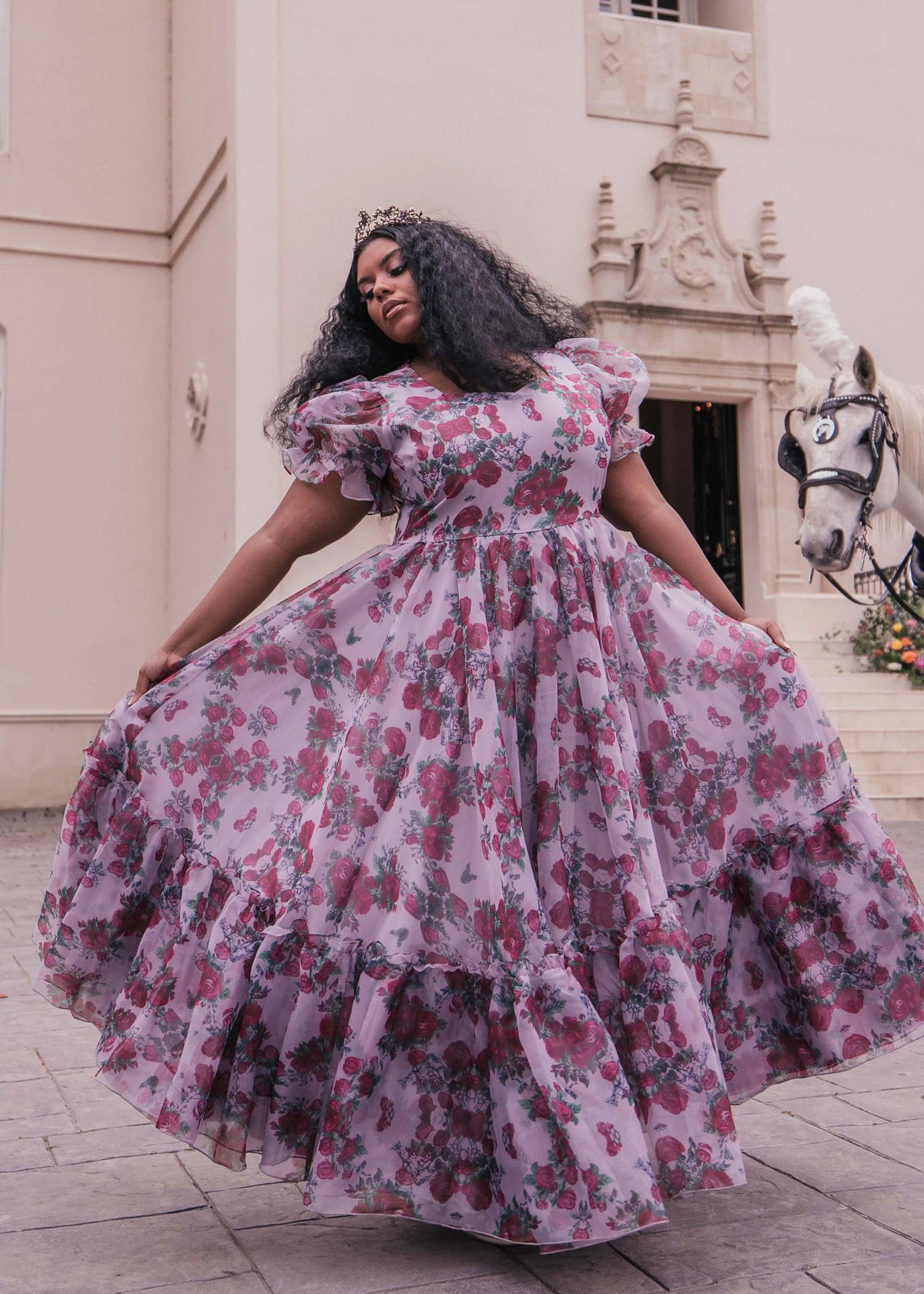 Lavender Cordelia Dress by JessaKae featuring a flowy silhouette and floral detailing, displayed on a model.