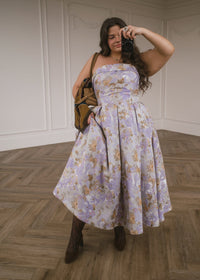 Lilac Anastelle strapless jacquard dress by JessaKae, featuring intricate floral patterns and a fitted bodice.