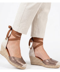 Jimena Mid Laces Bronze heeled sandal by Menina Step, handmade in Spain, shown from an angled side view with laces and medium heel