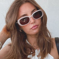 Black Cove by DIFF polarized sunglasses with sleek frame and tinted lenses, ideal for stylish sun protection.