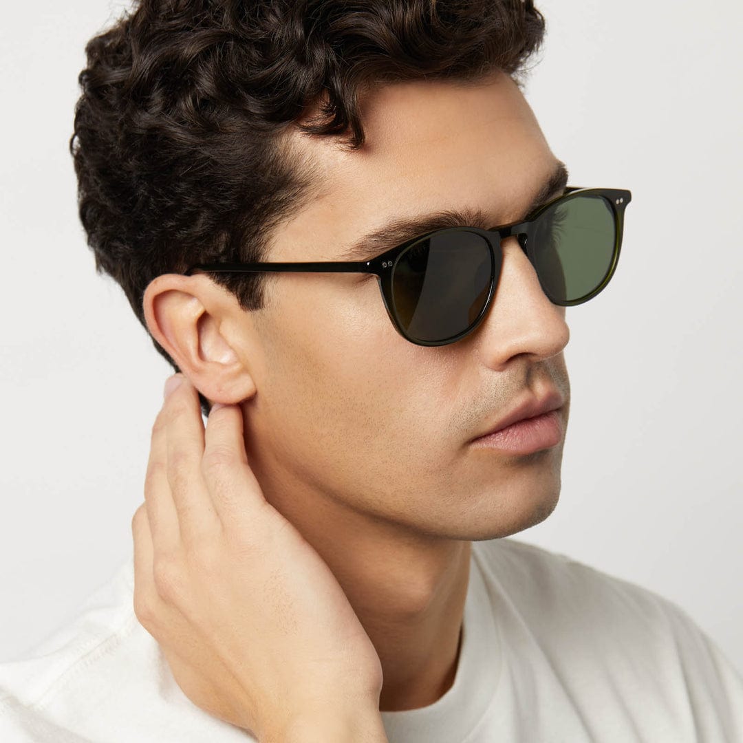 Jaxson by Diff polarized sunglasses with black frames and dark lenses, stylish eyewear for outdoor protection.
