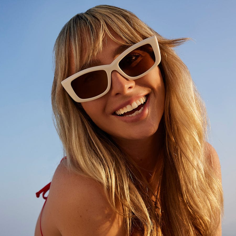 Olympic by DIME polarized sunglasses with dark tinted lenses and black frames, designed for outdoor sun protection.