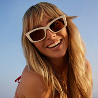 Olympic by DIME polarized sunglasses with dark tinted lenses and black frames, designed for outdoor sun protection.