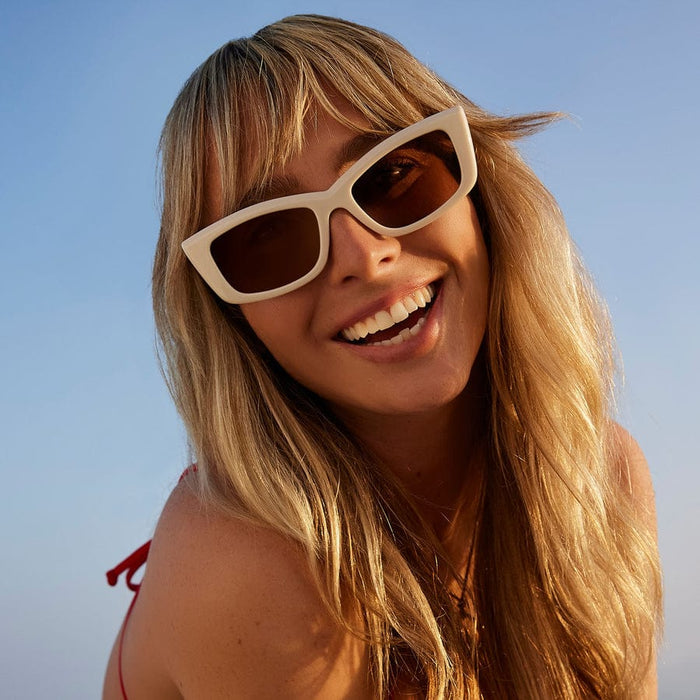 Olympic by DIME polarized sunglasses with dark tinted lenses and black frames, designed for outdoor sun protection.