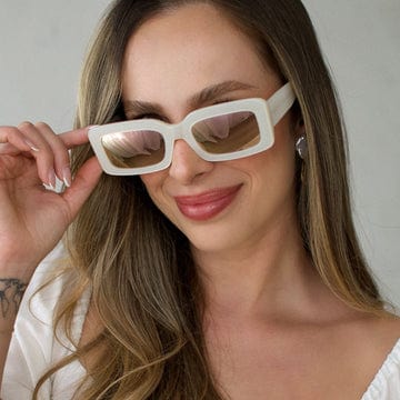 Polarized Indy by DIFF sunglasses with opaline frames and dark tinted lenses, featuring sleek design and UV protection.