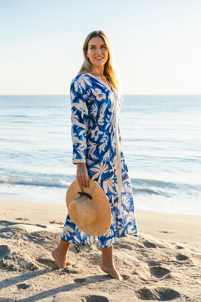 Kahora Palm Beach BARDOT DRESS by Dane featuring a flowy, patterned fabric with a fitted waist and short sleeves.