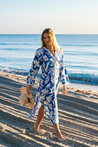 Kahora Palm Beach Bardot dress by Dane featuring off-shoulder design, lightweight fabric, and stylish floral pattern.