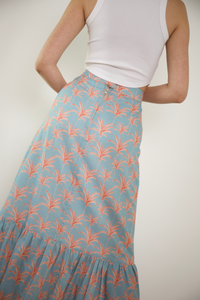 Blue Lizzie linen skirt by Kahora Palm Beach featuring a flowy design and palm print fabric.