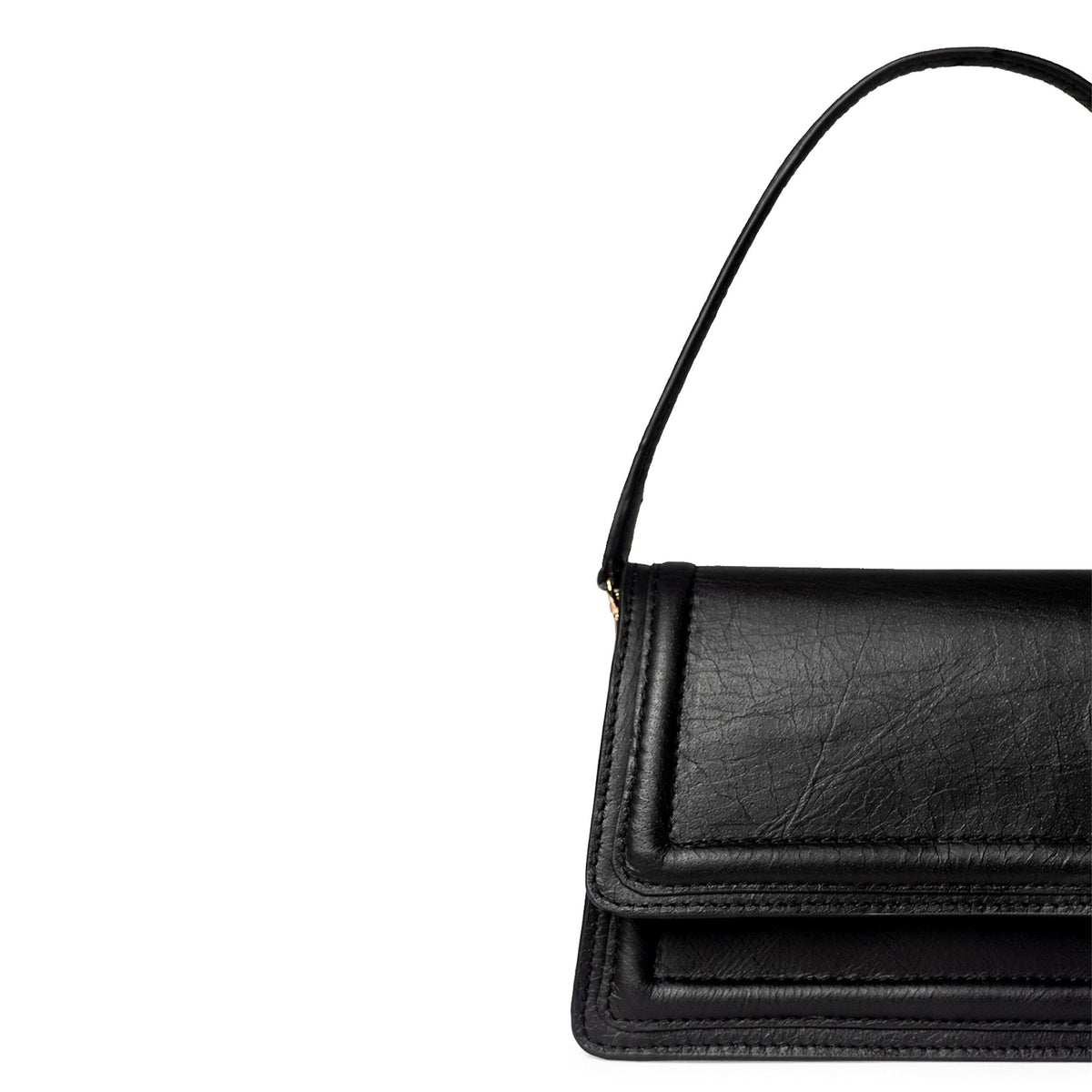Black leather mini crossbody bag by Kila Siku featuring a sleek design and adjustable strap, perfect for everyday use.