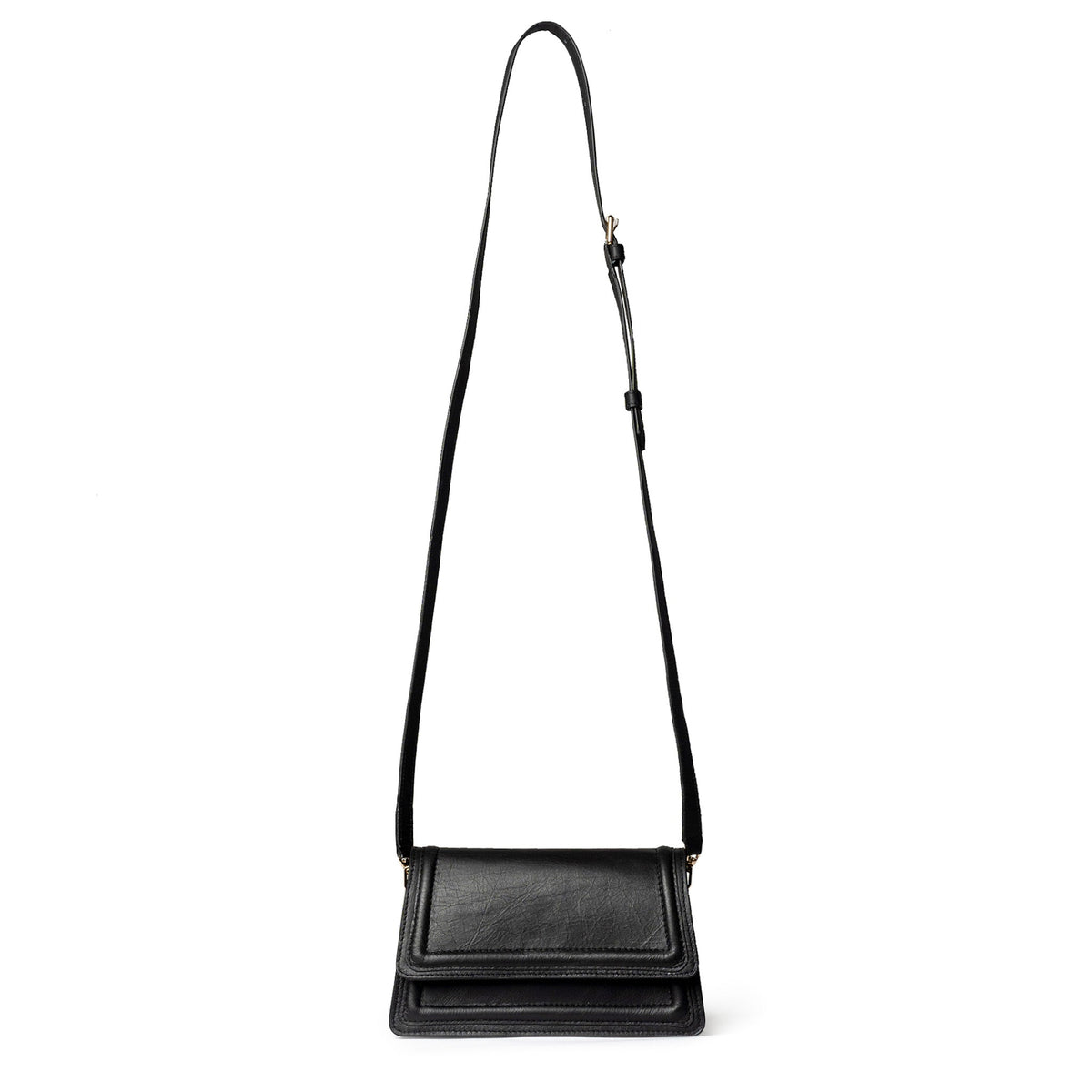 Black leather mini crossbody bag by Kila Siku with adjustable strap and sleek design, shown on a neutral background.