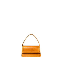 Kila Siku camel leather mini crossbody handbag with adjustable strap and compact design, suitable for everyday use.