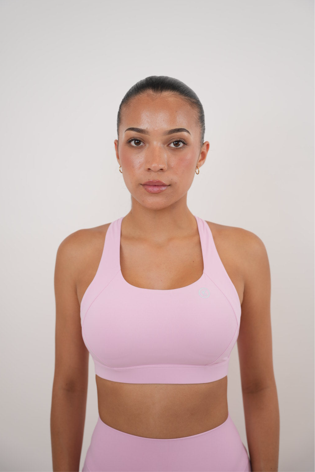 KIMITH BRAND pink blossom quick dry butter bra with smooth fabric and floral design, displayed on a hanger.
