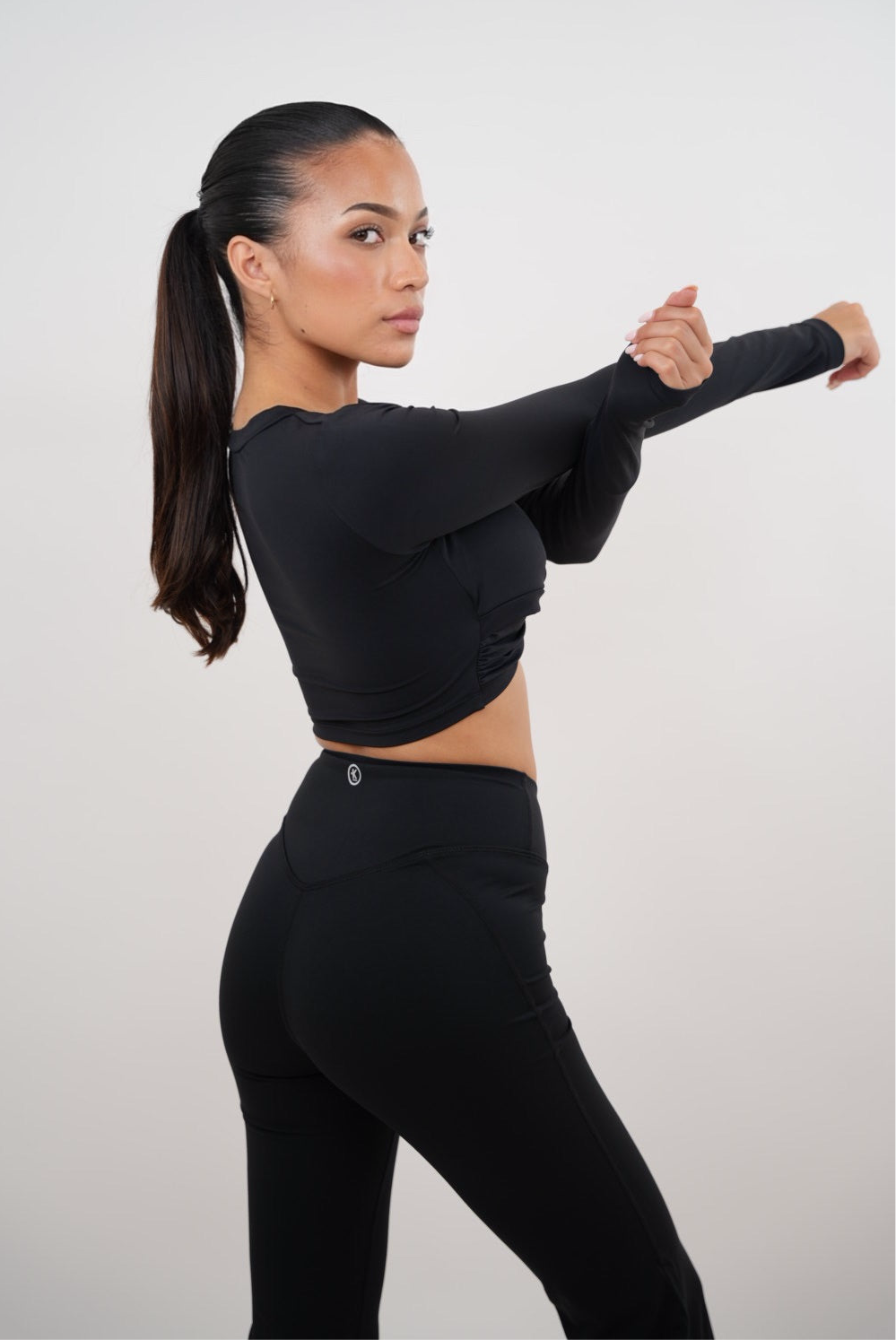 Black KIMITH BRAND I Am Present elegant bra with delicate lace detailing and comfortable fit, shown on a neutral background.