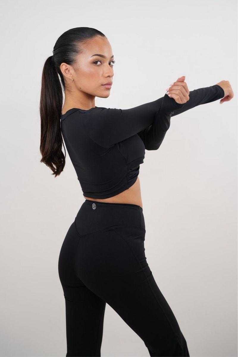 Black KIMITH BRAND I Am Present elegant bra with delicate lace detailing and comfortable fit, shown on a neutral background.
