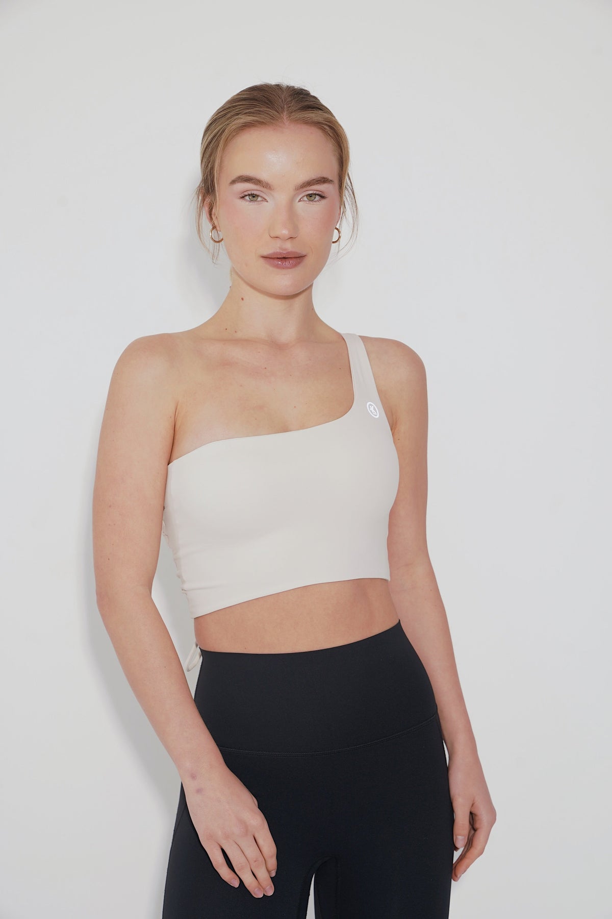 Ivory I Am Wise tie-up bra by Kimith Brand, featuring adjustable straps and delicate lace details on the front.
