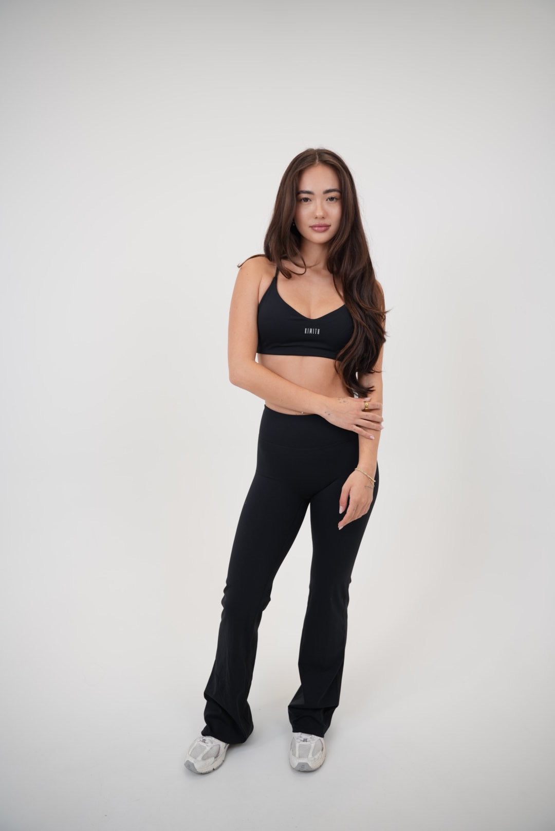Black sports bra from KIMITH BRAND featuring a comfortable fit and stylish design for activewear.