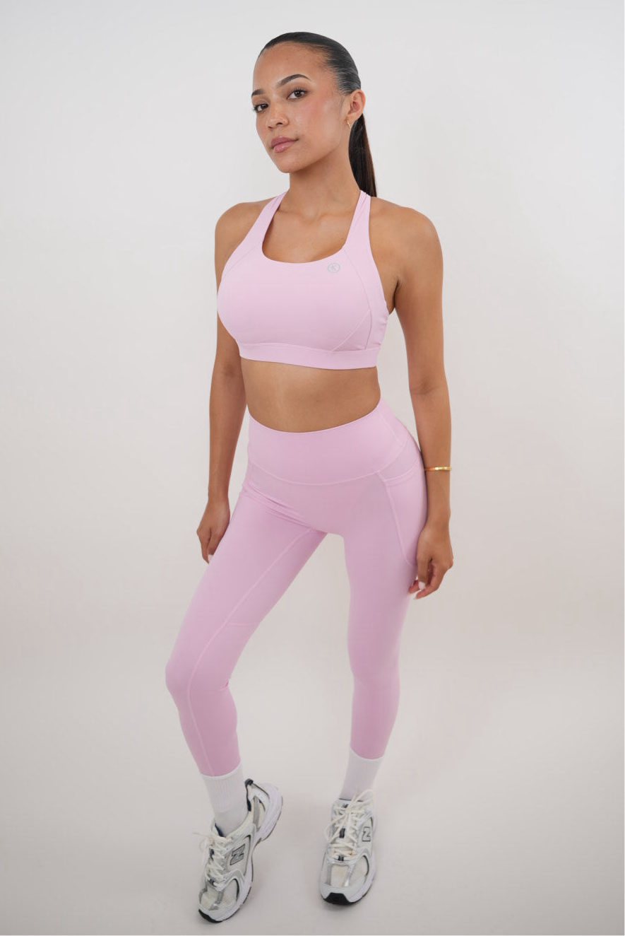 Pink Blossom quick dry butter leggings by KIMITH BRAND with a smooth, shiny finish and fitted style, shown on a model.