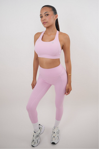 Pink Blossom quick dry butter leggings by KIMITH BRAND with a smooth, shiny finish and fitted style, shown on a model.