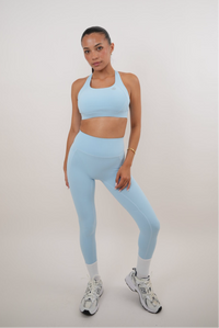 Sky blue quick-dry butter leggings by KIMITH BRAND, featuring a smooth fit and comfortable stretch for active wear.