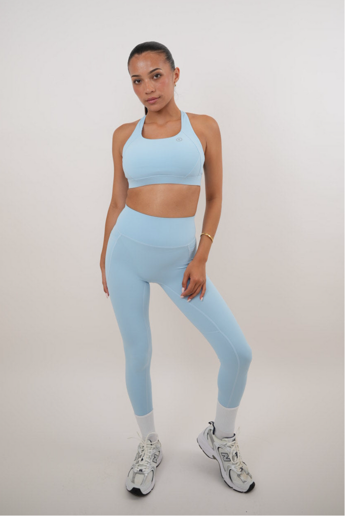 Sky blue quick-dry butter leggings by KIMITH BRAND, featuring a smooth fit and comfortable stretch for active wear.